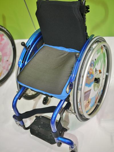 Simba wheelchair with round tube frame--attach using a Bridge Clamp 