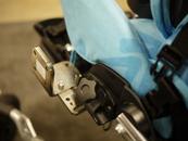 An L-Angle Extension is shown attached to offset/reposition the Wheelchair Bracket.