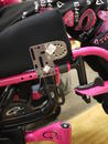 Adapter Plate 4, with an Angle Adjustment Plate attached so Wheelchair Bracket can be vertical in her most typical sitting angle.