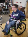 The positioning also allowed for transfers to a walker. His walker has a Tilt'n Turner attached, so he detaches his speech device from the chair and moves it to the walker.