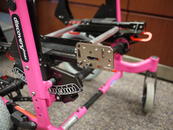 Attach the Adapter Plate 4 to the side frame, orienting the threads for easy attachment of the Wheelchair Bracket.