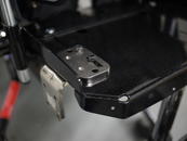Adapter plate and L-Angle, attached so L-Angle face is just outside the seat pan.