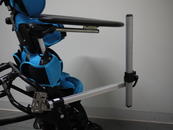 Insert horizontal post, with a Wheelchair Bracket on the end to receive the mount post.
