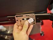 Align the 8mm slot and hole on the Adapter Plate 4 with the two holes currently in use. Remove those bolts and replace with longer ones. Be careful to replace the legrest assembly in the same position.