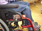 In this case, the Adapter Plate 4 is attached to the frame in a vertical orientation. The Adapter Plate 2 is attached to the AP4, bringing the Wheelchair Bracket placement forward, past the armrest.