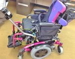 Daessy system with an offset attached to the armrest of an Invacare TDX