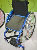 Simba wheelchair with round tube frame--attach using a Bridge Clamp 
